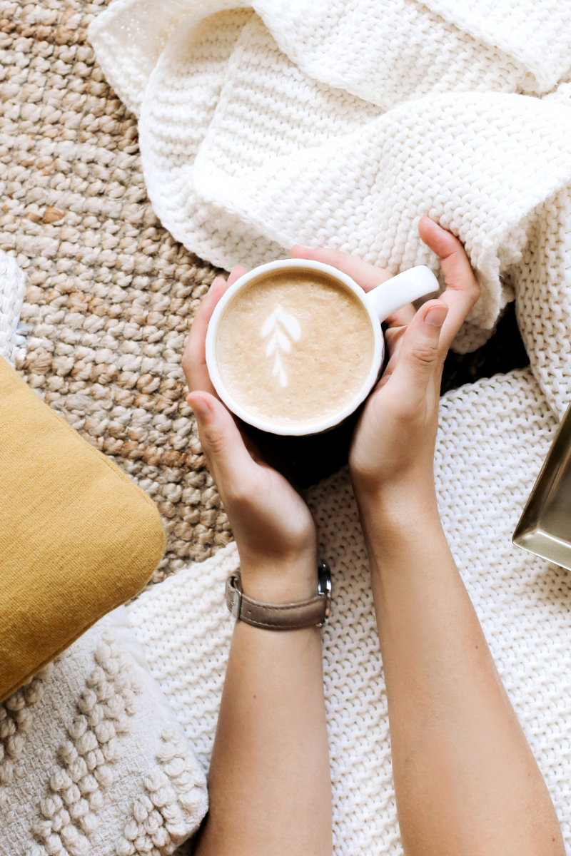 Holding a cup of coffee and being mindful 